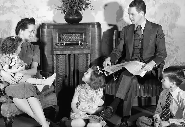 family listening to radio